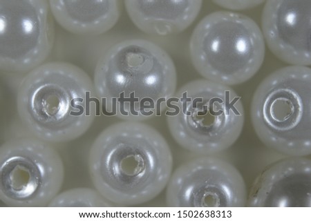 Beads on the White Background. 
Multi-colored beads