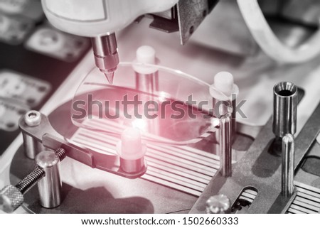 Lens manufacturing in modern laboratory. Royalty-Free Stock Photo #1502660333