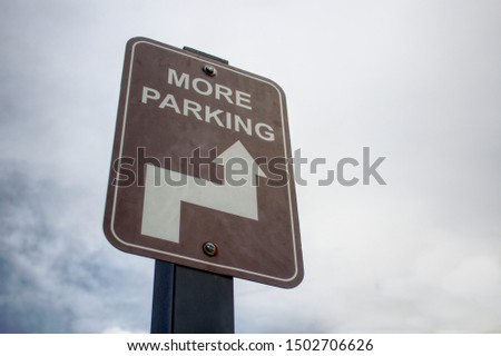 More parking sign with arrow Royalty-Free Stock Photo #1502706626