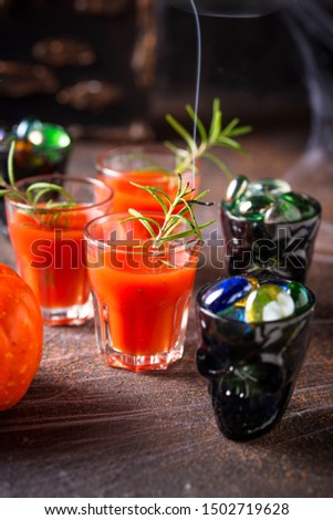Halloweens drink bloody Mary cocktail with rosemary