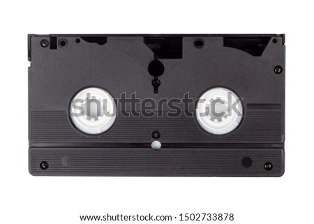 Single old vintage black blank VHS video cassette isolated on white, back side. Retro technology, vcr, outdated obsolete vhs tape, tech items from the 80s and 90s. One videotape on white, hq closeup Royalty-Free Stock Photo #1502733878