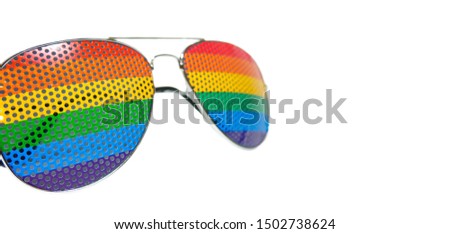 LGBT glasses isolated on white background. Sunglasses with LGBT rainbow lenses(with glare). Rainbow, LGBT pride. Closeup. Human rights concept. Aviators or droplets - model of sunglasses.