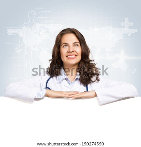Young attractive female doctor put her hands on the blank banner, place for text