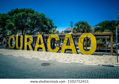 In the heart of Curacao (Willemstad) at the Queen Wilhelmina Park you will see a picture with the letters "DUSHI" and "CURACAO" and the statue which is pretty typical if you are visiting Curacao.