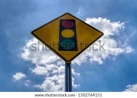 Traffic light ahead sign with blue sky Royalty-Free Stock Photo #1502764151