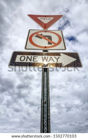 Yield no left turn one way Royalty-Free Stock Photo #1502770103