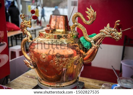 Chinese traditional tea sets, large teapots boiling water with charcoal 