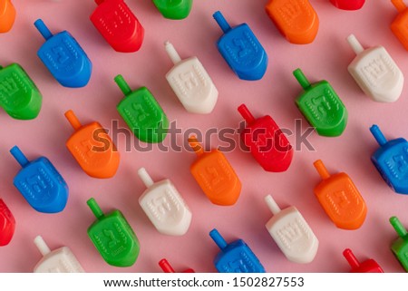 Dreidels used for a game during the Jewish holiday of Hanukkah. A way to celebrate Chanukah and Judaism during the Hebrew holidays.