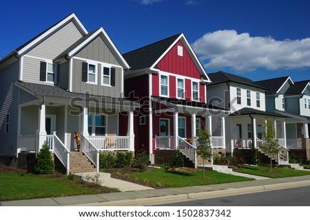 Red and Gray Row Houses Royalty-Free Stock Photo #1502837342
