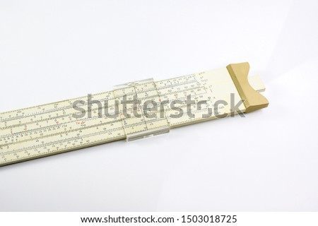 Slide Rule Mechanical mathematical Scientific calculator  used in Education and industry on a white background
