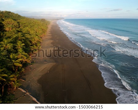 bird eye view of beach in Costa Rica with drone