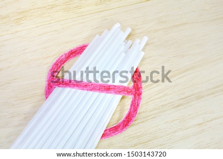 Straws on a wooden background. Concept No Plastic Zero Waste plastic