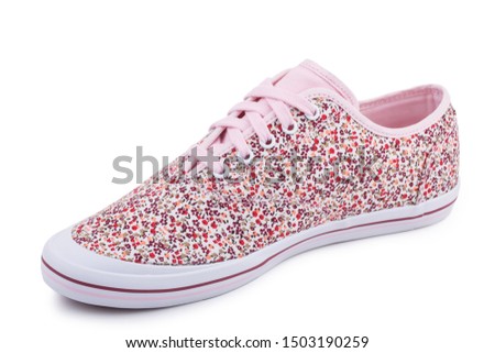One pink floral pattern fiber fabric casual sneakers shoe isolated white background