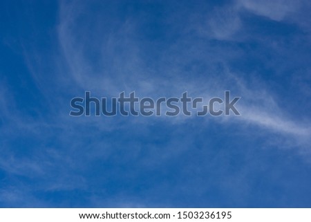 Fluffy clouds flowing and the blue sky
