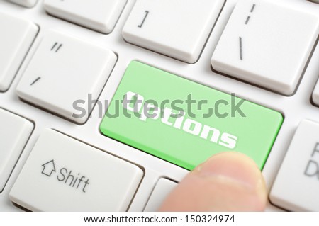 Hand pressing options key on keyboard