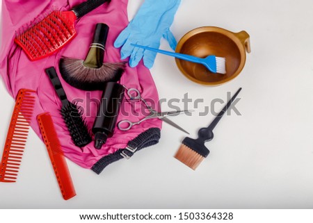 Professional Hairdresser Tools.
Dye and tint your hair. Set of tools for beauty salon. Glove, brush, jar