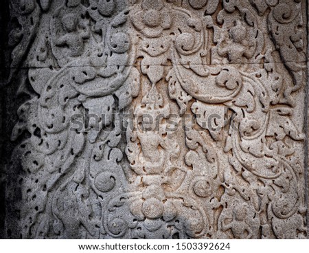 CAMBODIA Stone carving on the wall inside the Angkor Wat temple ruins, Cambodia, the Buddhist temple 