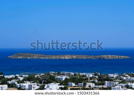 A view of the town Dryos and the Aegean Sea on the Island of Paros, Greece.