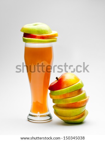Picture of colorful chopped apples and apple juice