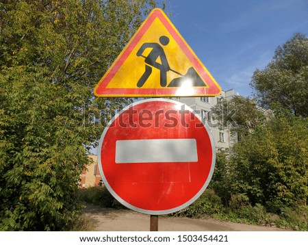 Road work sign. Sign for a car driver.