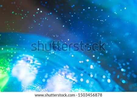 abstract blurred futuristic sci-fi fountain water with reflection of lights background