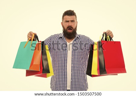 Black Friday. Nice purchase. Cyber Monday. Shopping sale. Male barber care. Mature hipster with beard. Bearded man with shopping bags.. brutal sad caucasian hipster with moustache.