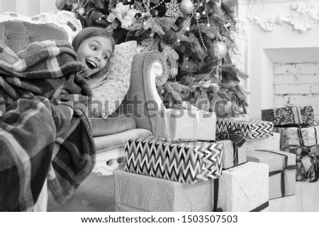 The morning before Xmas. Little girl. Happy new year. Winter. xmas online shopping. Come Santa Clause and don t delay. Family holiday. Christmas tree and presents. Child enjoy the holiday.