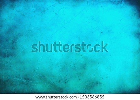 bright shades of blurred mottled antiqued blue lit background