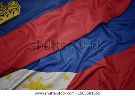waving colorful flag of philippines and national flag of liechtenstein. macro