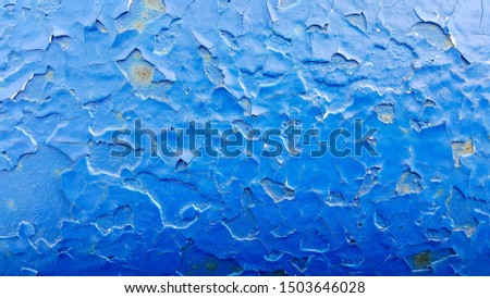 iron in several layers painted with blue paint, which eventually corroded and formed a crack and vertical traces, turned bright blue beautiful background