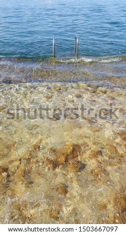 Blue sea water of the Kolovare beach in Zadar, Croatia