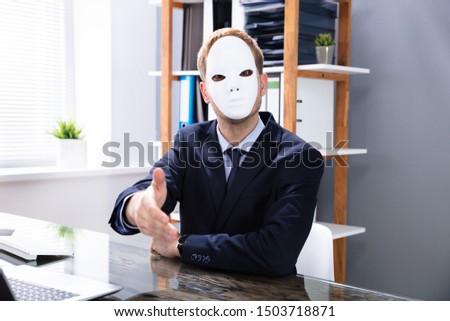 Sleazy Young Salesman Offering Handshake In Office Royalty-Free Stock Photo #1503718871
