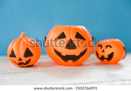 Halloween background blue decorated holidays festive concept / jack o lantern pumpkin halloween decorations for party accessories object on wood 