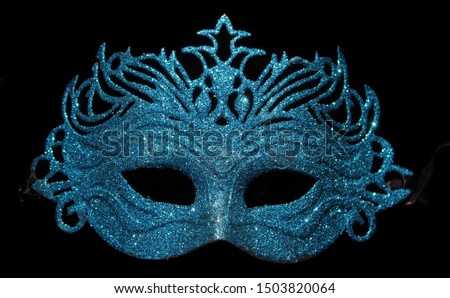 Blue Glitter Carnival Mask on Black Background
