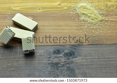 Picture of Crispy chocolate wafers with granulated sugar on the table