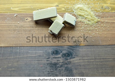 Picture of Crispy chocolate wafers with granulated sugar on the table