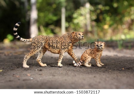 
Beautiful cheetah figures. Collecting figures of different animals.