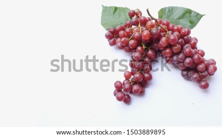 close up Black and red grape of fresh on white background