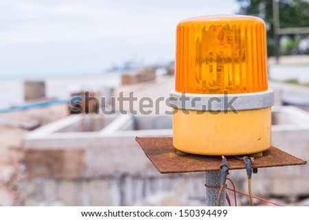 yellow siren in construction site