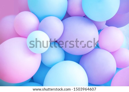 Colorful balloons background, punchy pastel colored and soft focus. pink and mint balloons photo wall birthday decoration Royalty-Free Stock Photo #1503964607