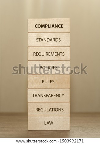 Chief Compliance officer Concept in wooden blocks Royalty-Free Stock Photo #1503992171