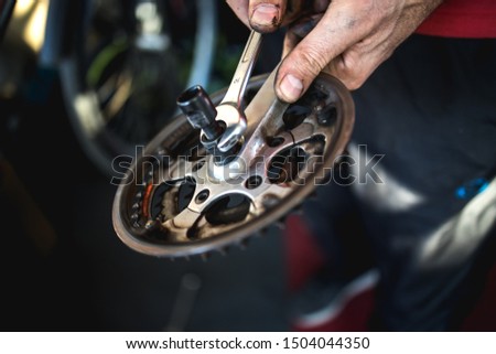 Fixing the bicycle problem in workshop stock photo