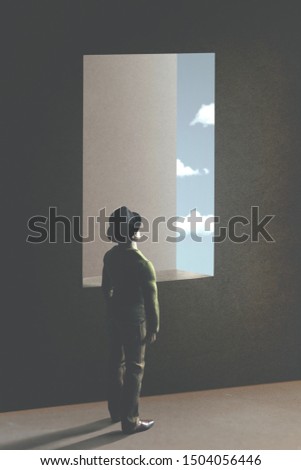 man watching the sky trought a surreal window; abstract concept Royalty-Free Stock Photo #1504056446