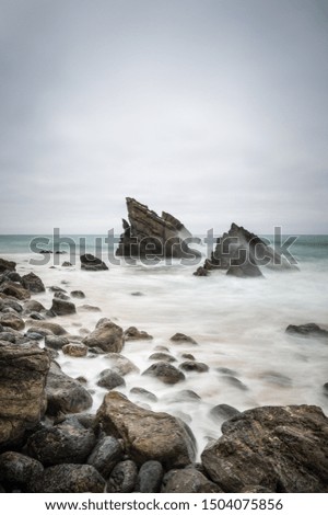 Rocks in the ocean in Sintra , Portugal Lisboa (Lisbon) , Long exposure picture of the waves