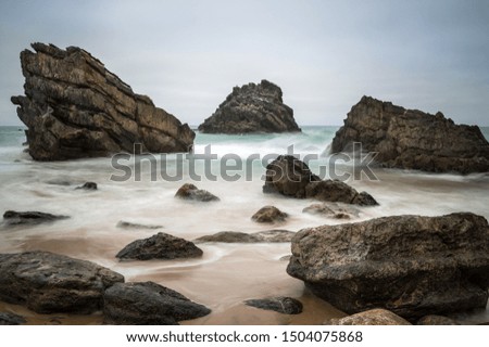 Rocks in the ocean in Sintra , Portugal Lisboa (Lisbon) , Long exposure picture of the waves