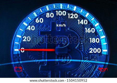 Image of bitcoin and car speedometer. Collage. The concept of the fall of digital cryptocurrency. The issue of digital currency development.
