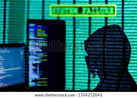 Man in hood and mask is hacking password. Programmer is writing code on multiple screens to steal private information. Inscription of system failure on background. Hacker attack concept.