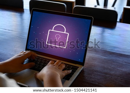 Laptop Computer with Data protection, Cyber security, information safety and encryption concept. internet technology and business concept, Mockup with copy space. Royalty-Free Stock Photo #1504421141