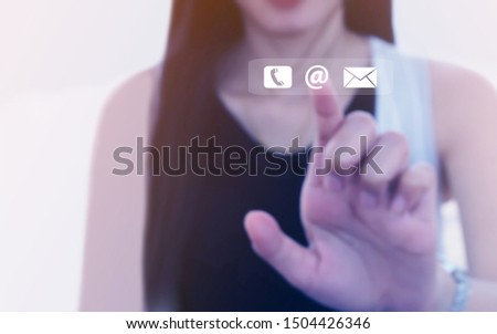 Blurred image of business women touching mobile phone icons, letters and emails Customer Service Center Contact Us.