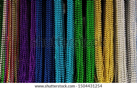 Rainbow assortment of Mardi gras beads 